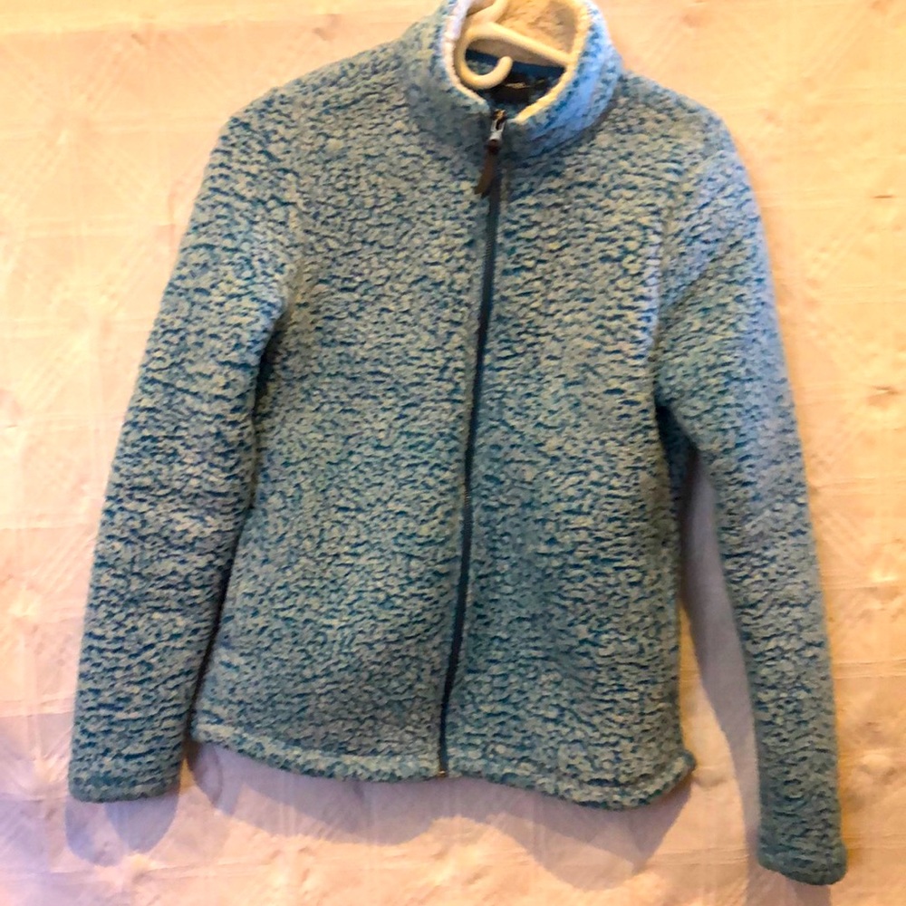 Blue George sweater.